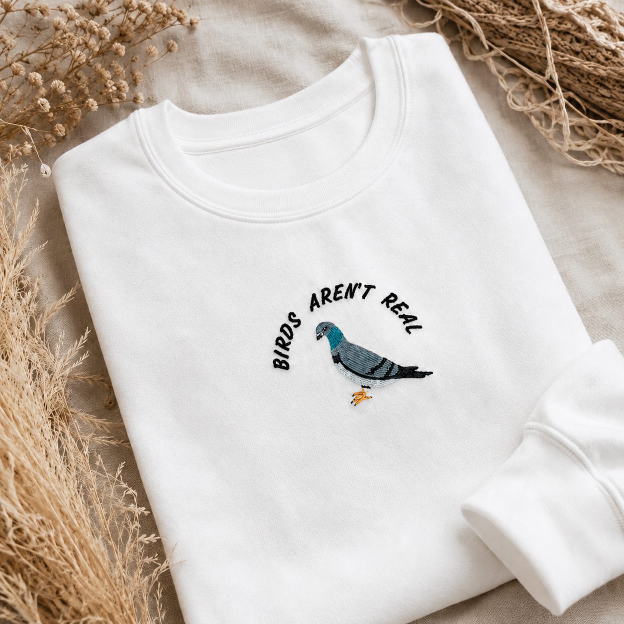 Birds Aren't Real Embroidered Sweater